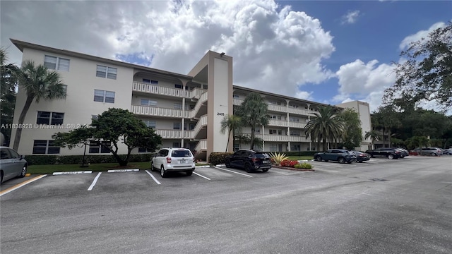 2405 Antigua Cir Unit H1, Coconut Creek, FL 33066 - view of apartment building / complex with uncovered parking