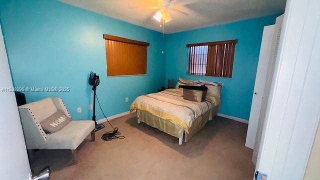 2385 W 69th St Unit 2385-B, Hialeah, FL 33016 - bedroom with carpet and a ceiling fan