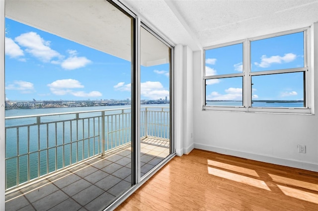770 Claughton Island Dr Unit 1915, Miami, FL 33131 - unfurnished sunroom featuring a water view