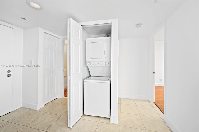 770 Claughton Island Dr Unit 1915, Miami, FL 33131 - laundry room with stacked washing machine and dryer and light tile patterned floors