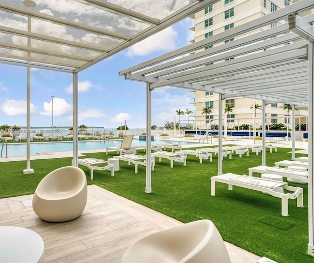 770 Claughton Island Dr Unit 1915, Miami, FL 33131 - view of community with a lawn, a swimming pool, and a water view