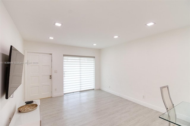 5387 SW 40th Ave Unit 202, Dania Beach, FL 33314 - empty room featuring light wood-style flooring and recessed lighting
