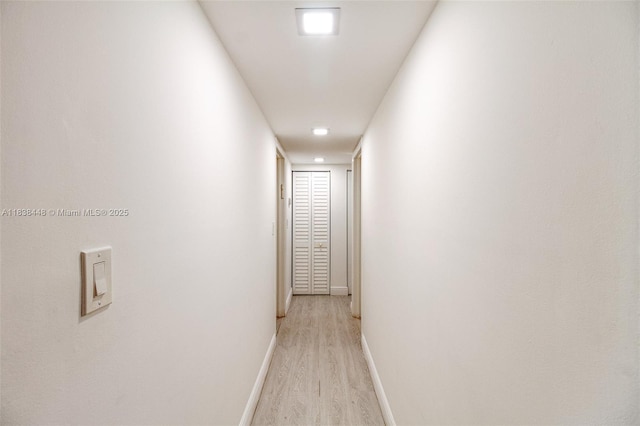 5387 SW 40th Ave Unit 202, Dania Beach, FL 33314 - hall with light wood-type flooring and baseboards