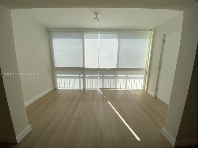 4400 Hillcrest Dr Unit 314B, Hollywood, FL 33021 - spare room featuring wood finished floors