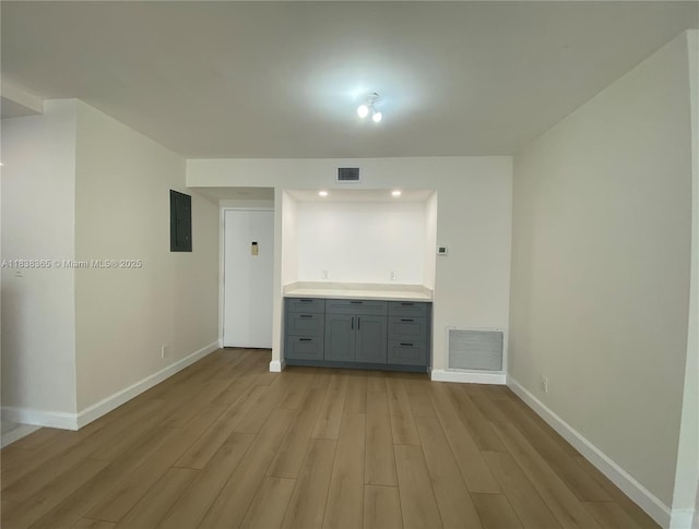 4400 Hillcrest Dr Unit 314B, Hollywood, FL 33021 - empty room featuring light wood-type flooring and electric panel