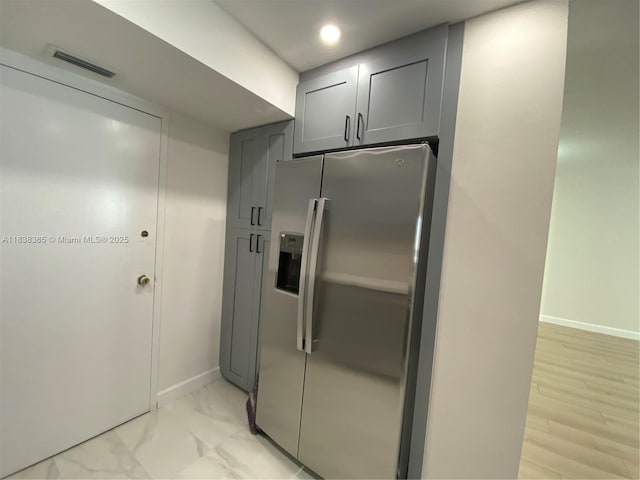 4400 Hillcrest Dr Unit 314B, Hollywood, FL 33021 - kitchen featuring stainless steel fridge with ice dispenser, gray cabinets, and recessed lighting