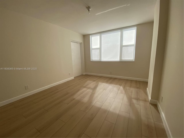 4400 Hillcrest Dr Unit 314B, Hollywood, FL 33021 - spare room featuring light wood-style floors and baseboards