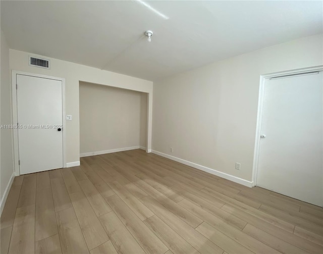 4400 Hillcrest Dr Unit 314B, Hollywood, FL 33021 - spare room with light wood-style flooring and baseboards