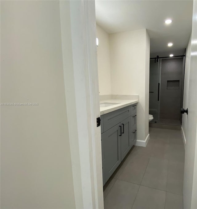 4400 Hillcrest Dr Unit 314B, Hollywood, FL 33021 - bathroom featuring vanity, a shower stall, tile patterned flooring, and recessed lighting