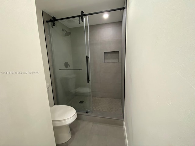 4400 Hillcrest Dr Unit 314B, Hollywood, FL 33021 - bathroom featuring a stall shower and tile patterned flooring