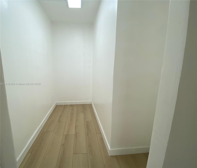 4400 Hillcrest Dr Unit 314B, Hollywood, FL 33021 - corridor featuring light wood-style flooring and baseboards