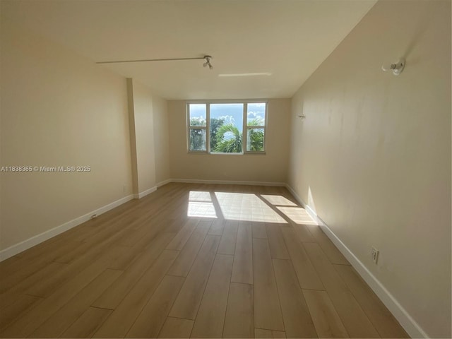 4400 Hillcrest Dr Unit 314B, Hollywood, FL 33021 - empty room with wood finished floors and baseboards