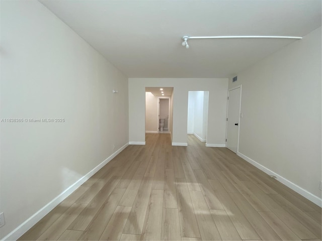 4400 Hillcrest Dr Unit 314B, Hollywood, FL 33021 - unfurnished room featuring light wood-type flooring and baseboards