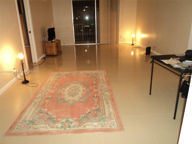 1050 93rd St Unit 6F, Bay Harbor Islands, FL 33154 - hall featuring tile patterned flooring and baseboards