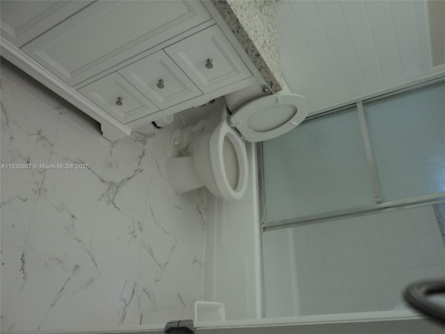 1050 93rd St Unit 6F, Bay Harbor Islands, FL 33154 - bathroom featuring toilet