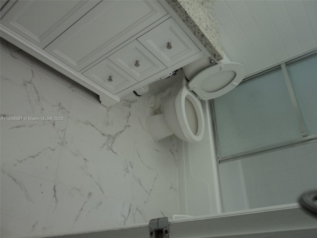 1050 93rd St Unit 6F, Bay Harbor Islands, FL 33154 - bathroom featuring toilet