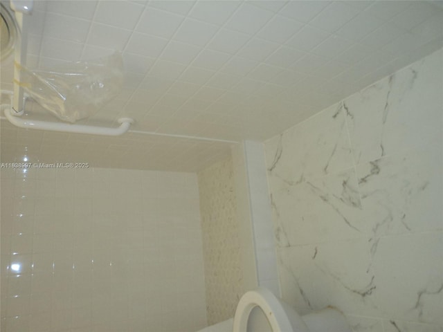 1050 93rd St Unit 6F, Bay Harbor Islands, FL 33154 - bathroom featuring toilet