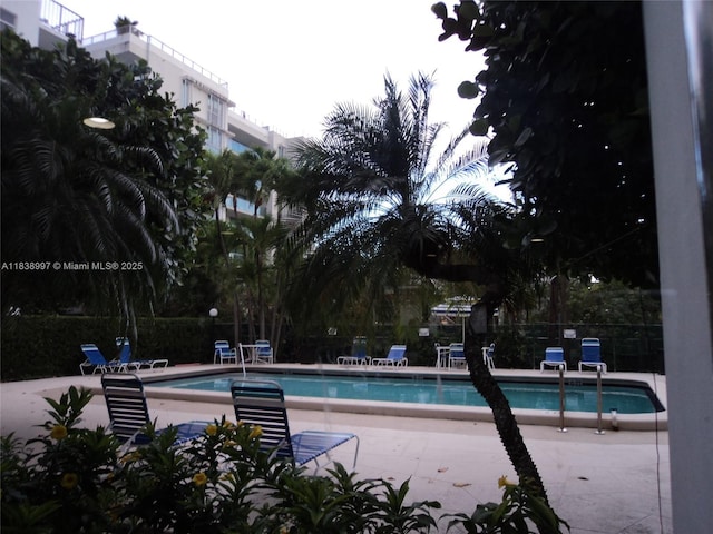 1050 93rd St Unit 6F, Bay Harbor Islands, FL 33154 - community pool with a patio