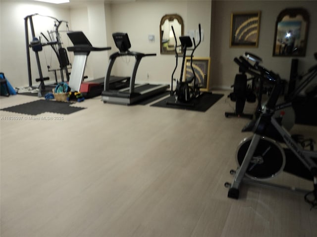1050 93rd St Unit 6F, Bay Harbor Islands, FL 33154 - workout area with wood finished floors