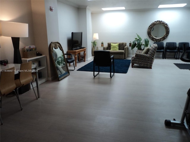 1050 93rd St Unit 6F, Bay Harbor Islands, FL 33154 - living area featuring wood finished floors and crown molding