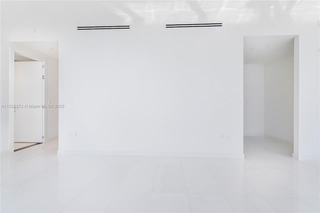 300 Biscayne Blvd Way Unit 4401, Miami, FL 33131 - empty room featuring light tile patterned floors and baseboards