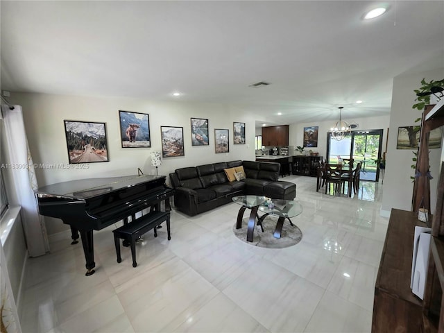 10120 NW 71st Pl, Tamarac, FL 33321 - living area with a chandelier and recessed lighting