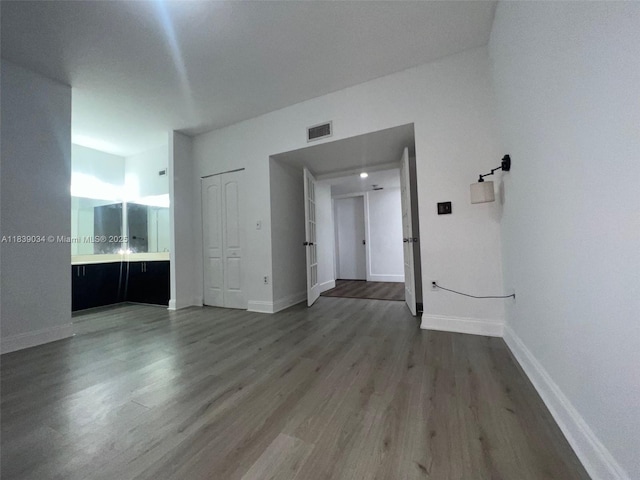 8831 SW 130th Pl Unit 106, Miami, FL 33186 - empty room with wood finished floors and baseboards