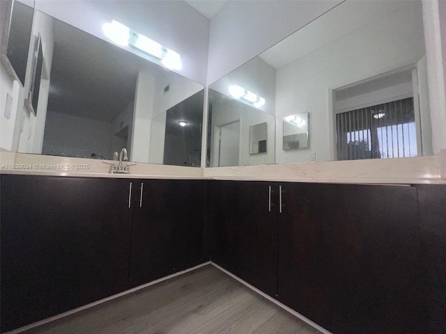 8831 SW 130th Pl Unit 106, Miami, FL 33186 - full bath featuring wood finished floors and double vanity