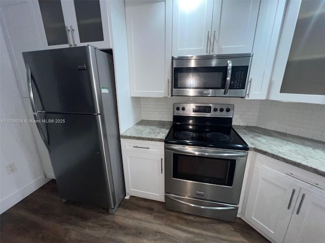 8831 SW 130th Pl Unit 106, Miami, FL 33186 - kitchen with appliances with stainless steel finishes and white cabinetry