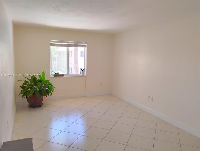 8605 SW 68th Ct Unit 22, Pinecrest, FL 33156 - unfurnished room featuring baseboards and light tile patterned floors
