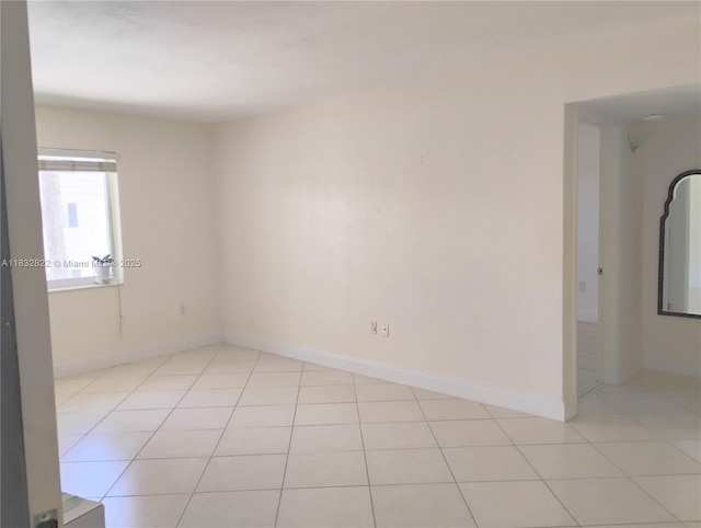 8605 SW 68th Ct Unit 22, Pinecrest, FL 33156 - unfurnished room featuring light tile patterned flooring and baseboards
