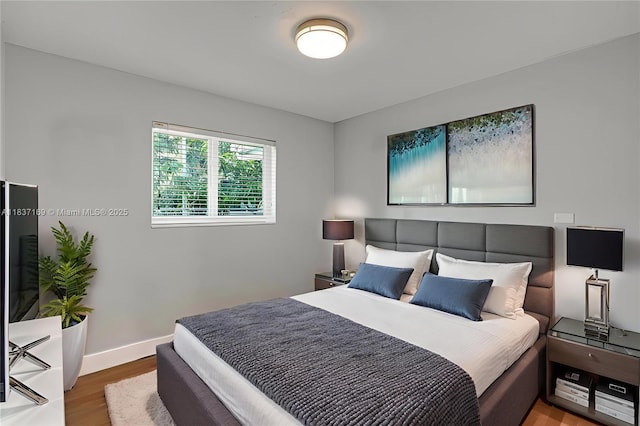 16000 N Miami Ave, Miami, FL 33169 - bedroom with wood finished floors and baseboards