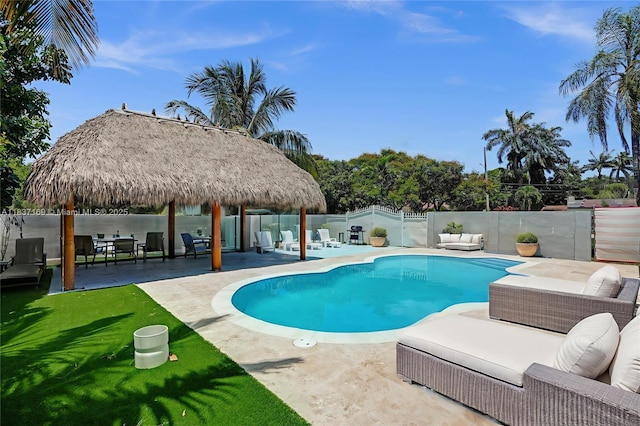 16000 N Miami Ave, Miami, FL 33169 - view of swimming pool with a patio, a gazebo, a fenced backyard, and an outdoor hangout area