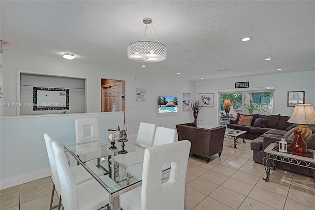 16000 N Miami Ave, Miami, FL 33169 - dining room with light tile patterned floors, recessed lighting, and a textured ceiling