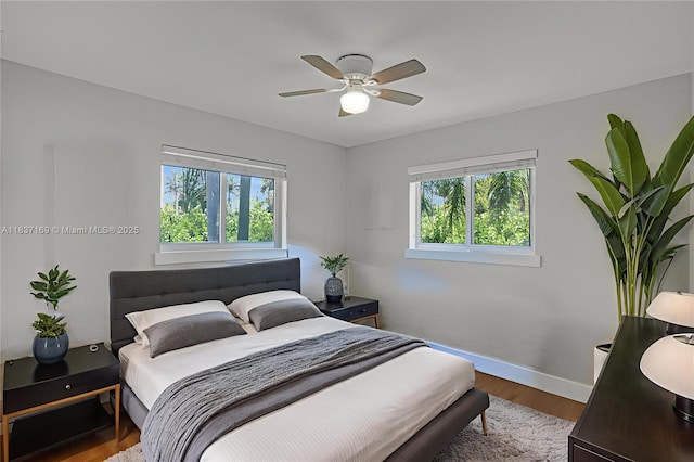 16000 N Miami Ave, Miami, FL 33169 - bedroom with multiple windows, wood finished floors, and ceiling fan