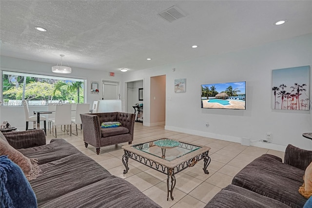 16000 N Miami Ave, Miami, FL 33169 - living area featuring light tile patterned floors, recessed lighting, and a textured ceiling