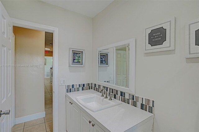 16000 N Miami Ave, Miami, FL 33169 - bathroom with tile patterned floors, vanity, and tasteful backsplash