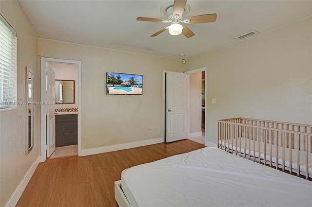 16000 N Miami Ave, Miami, FL 33169 - bedroom featuring light wood-style flooring and ceiling fan