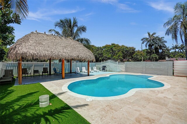 16000 N Miami Ave, Miami, FL 33169 - view of pool featuring a patio, a fenced backyard, and a gazebo