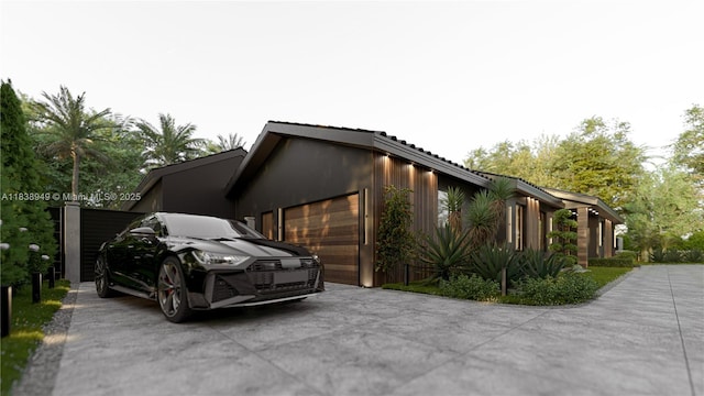 15321 SW 82nd Ave, Palmetto Bay, FL 33157 - view of home's exterior featuring an attached garage and concrete driveway