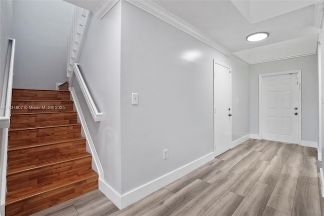 14834 SW 140th St, Miami, FL 33196 - foyer with crown molding, light wood finished floors, and stairs