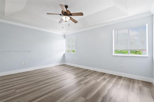 14834 SW 140th St, Miami, FL 33196 - empty room featuring ornamental molding, a textured ceiling, a ceiling fan, and wood finished floors