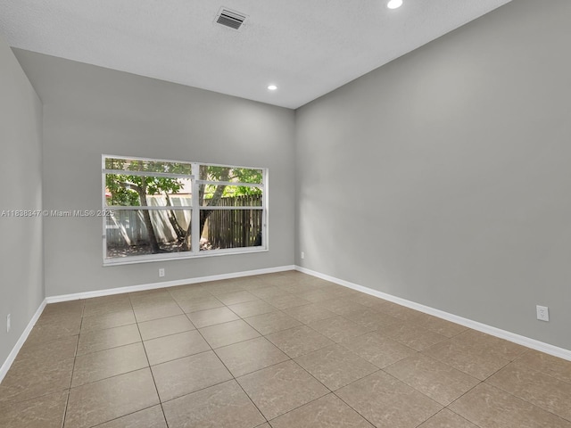 18232 SW 5th St, Pembroke Pines, FL 33029 - tiled spare room with recessed lighting and a textured ceiling