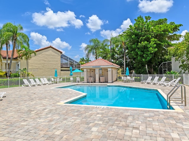 18232 SW 5th St, Pembroke Pines, FL 33029 - community pool with a patio