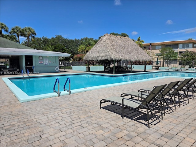 3635 SW Natura Ave Unit A, Deerfield Beach, FL 33441 - community pool featuring a gazebo and a patio