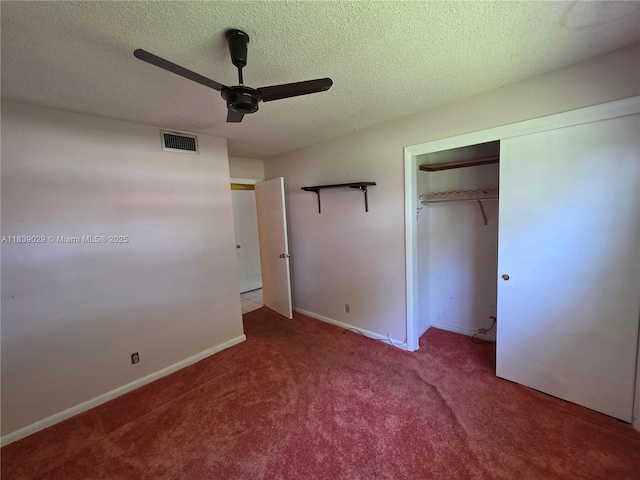 3635 SW Natura Ave Unit A, Deerfield Beach, FL 33441 - unfurnished bedroom featuring carpet, a textured ceiling, a ceiling fan, and a closet