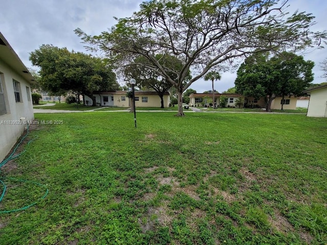 3635 SW Natura Ave Unit A, Deerfield Beach, FL 33441 - view of green lawn