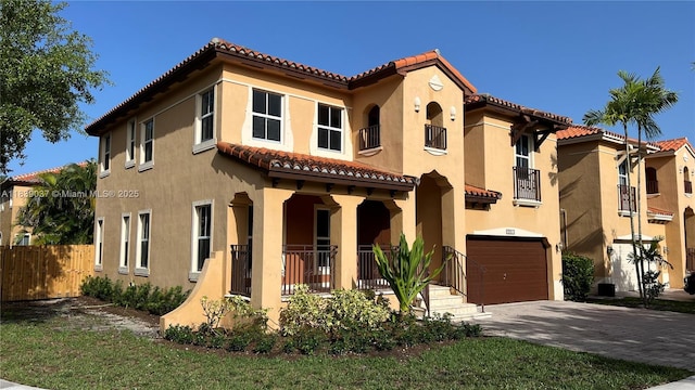 3001 SW 156th Ave, Miami, FL 33185 - mediterranean / spanish-style home with a tiled roof, stucco siding, an attached garage, and driveway