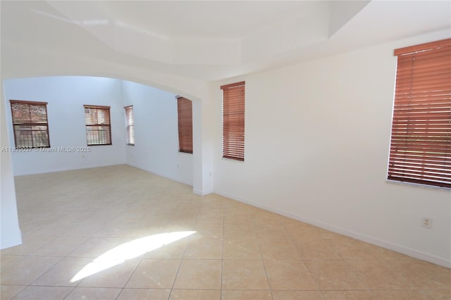 3001 SW 156th Ave, Miami, FL 33185 - unfurnished room featuring light tile patterned floors and arched walkways