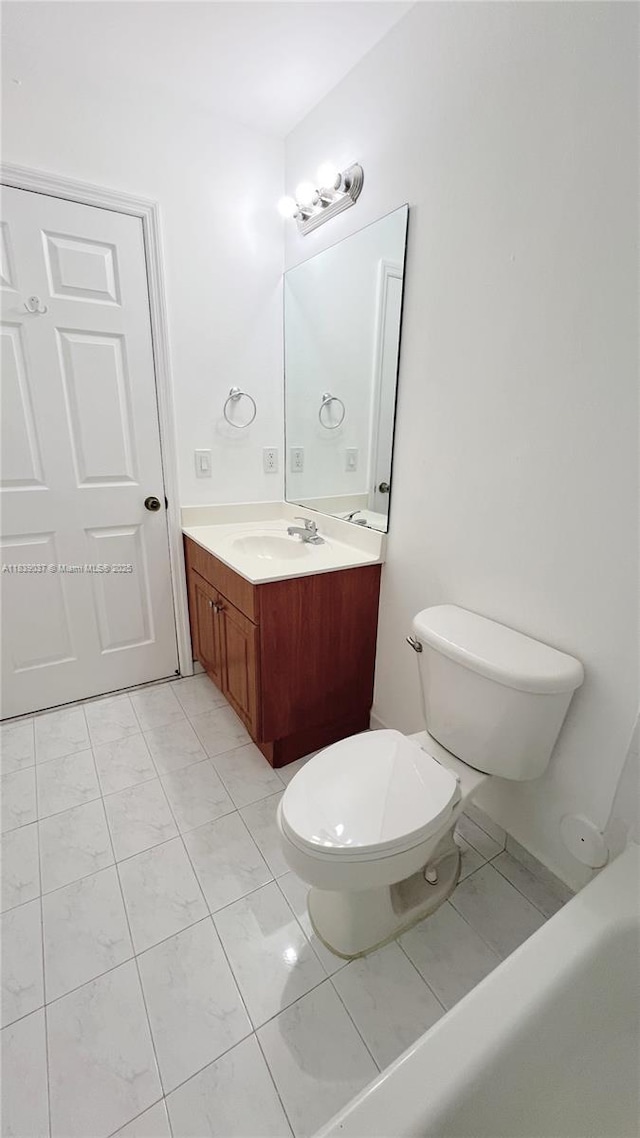 3001 SW 156th Ave, Miami, FL 33185 - bathroom with vanity, a bathtub, and marble look tile flooring